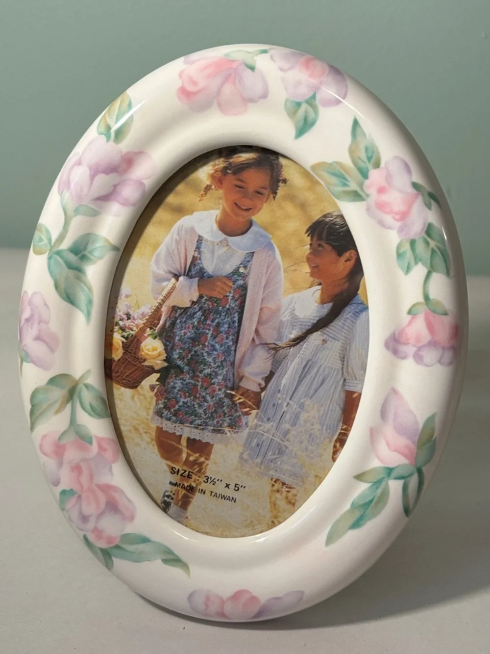 Oval Ceramic Photo Frame with Pink Floral Accent